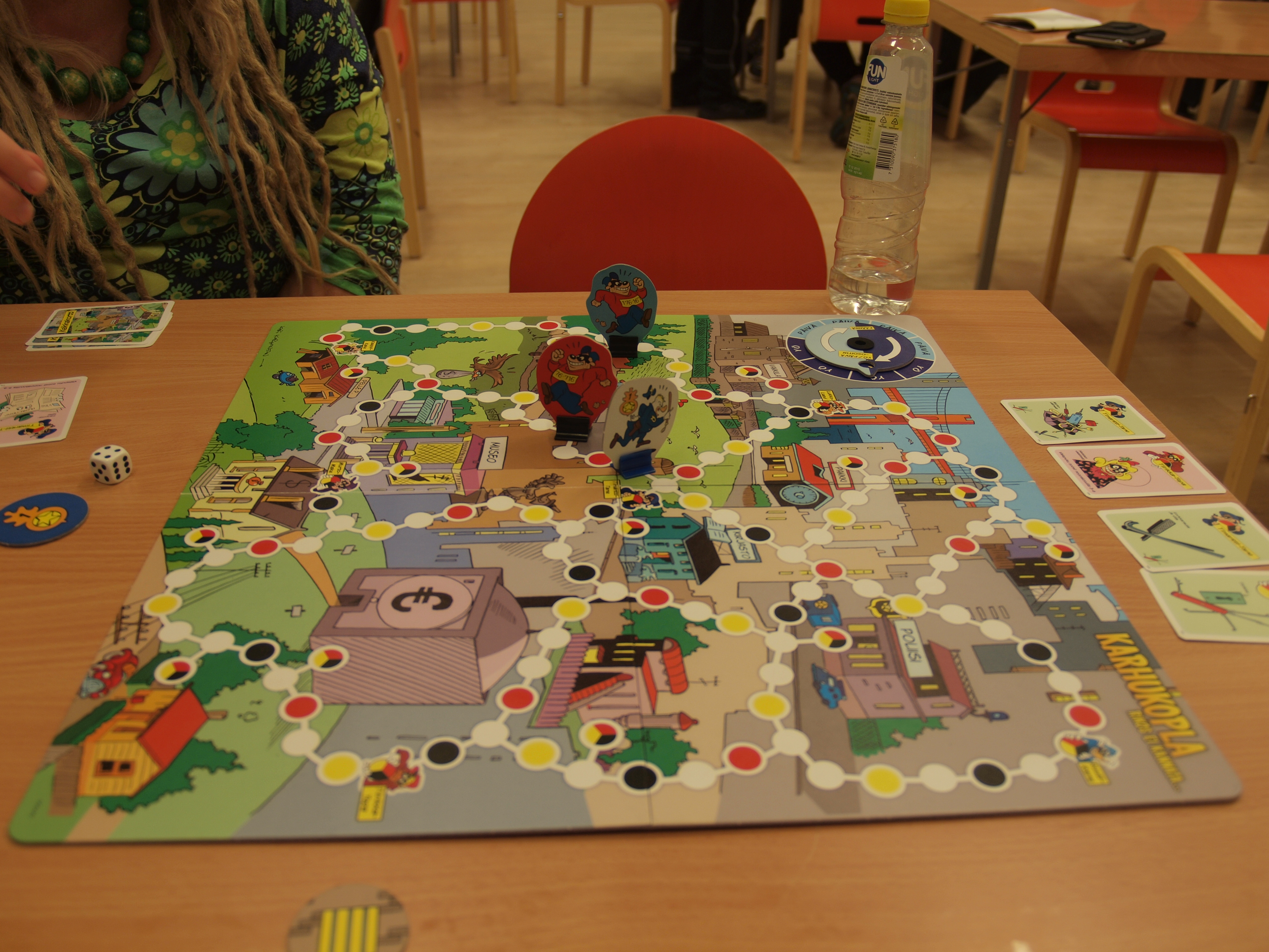 Children playing a Disney-themed board game that encourages creativity and imaginative play