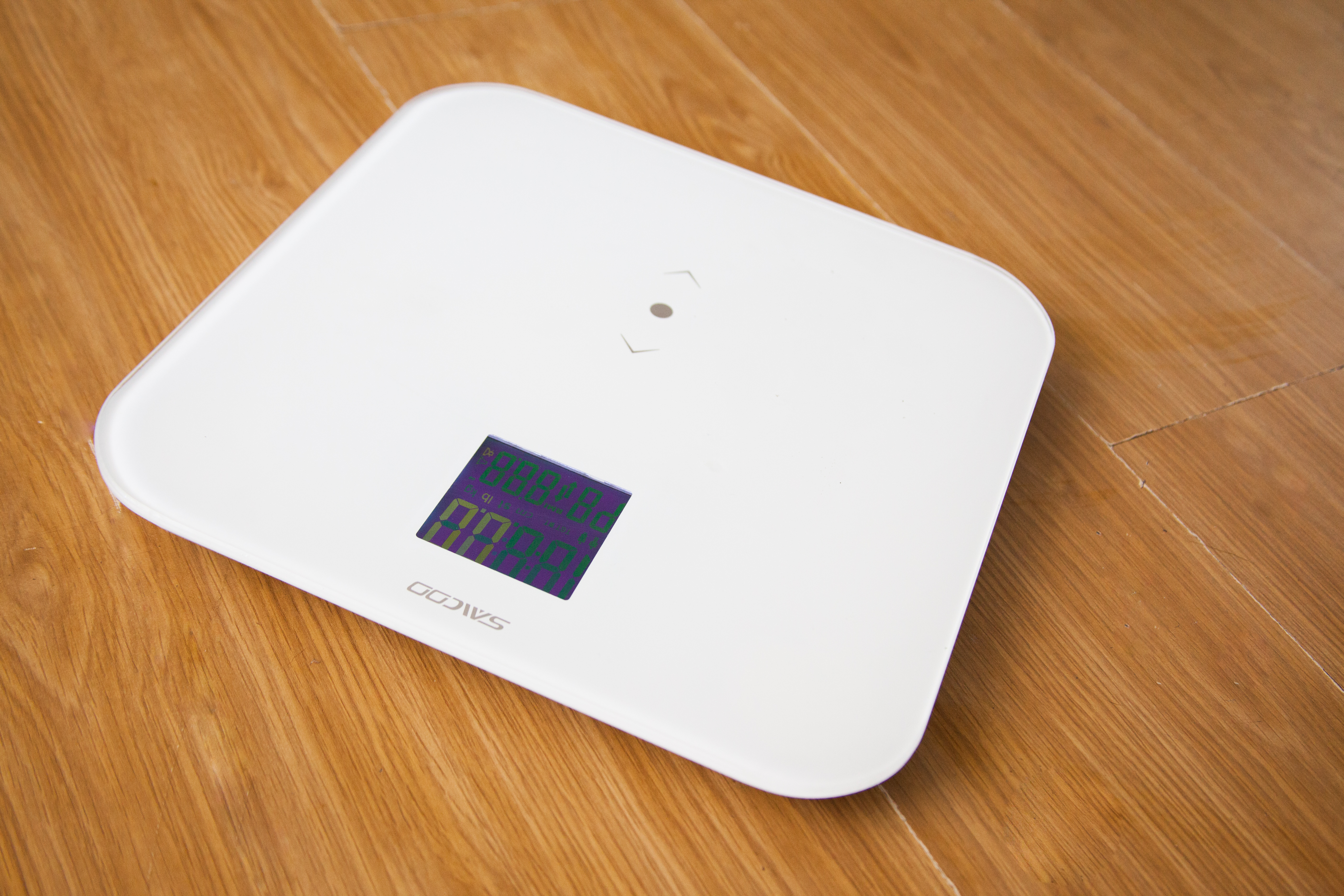 Digital weight scale on a floor