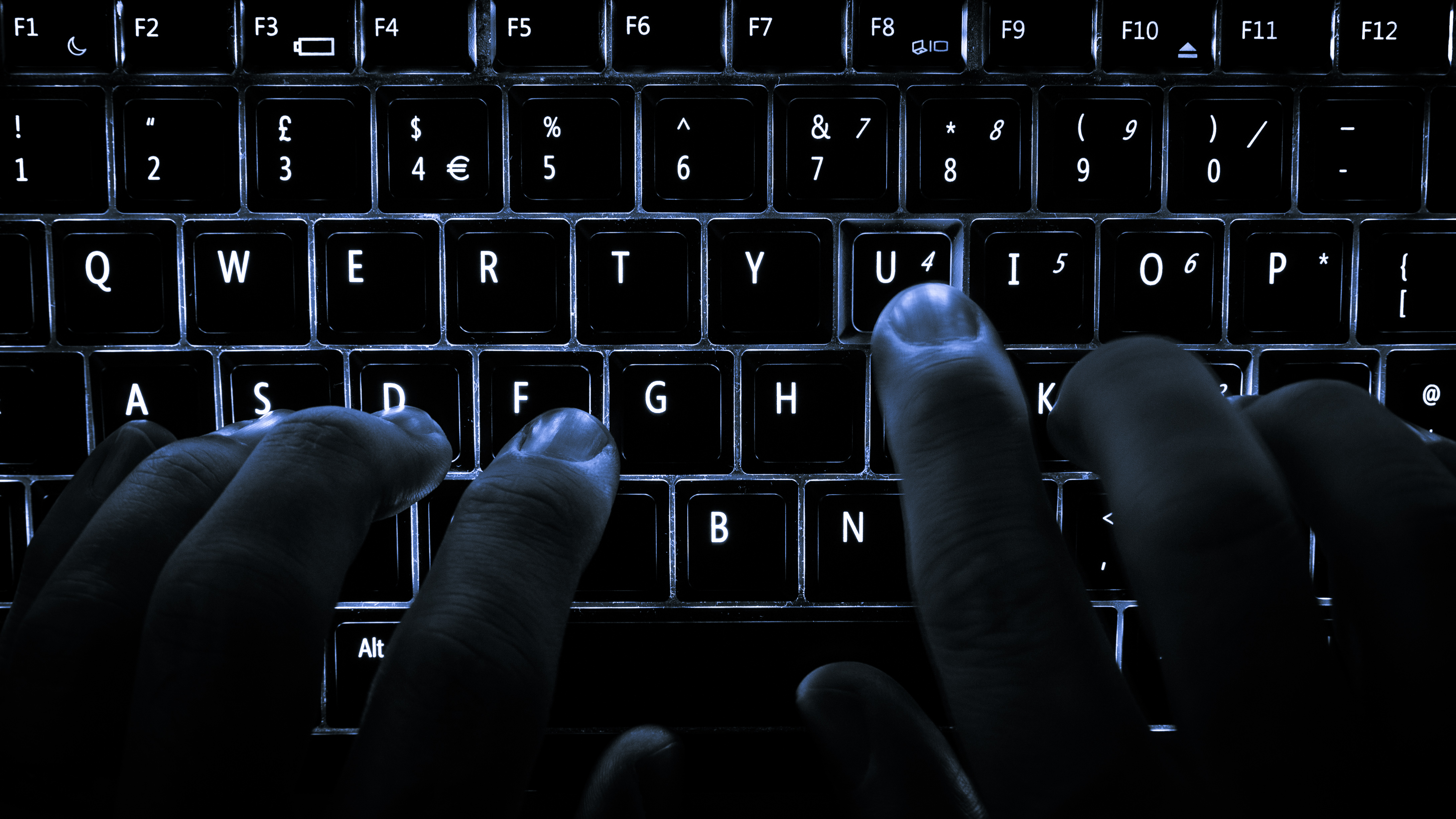 Backlit laptop keyboard in use