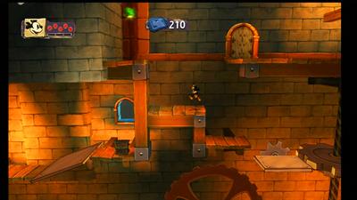 Disney Epic Mickey gameplay screenshot showing Mickey exploring the Wasteland